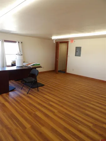 a view of cabinets and wooden floor