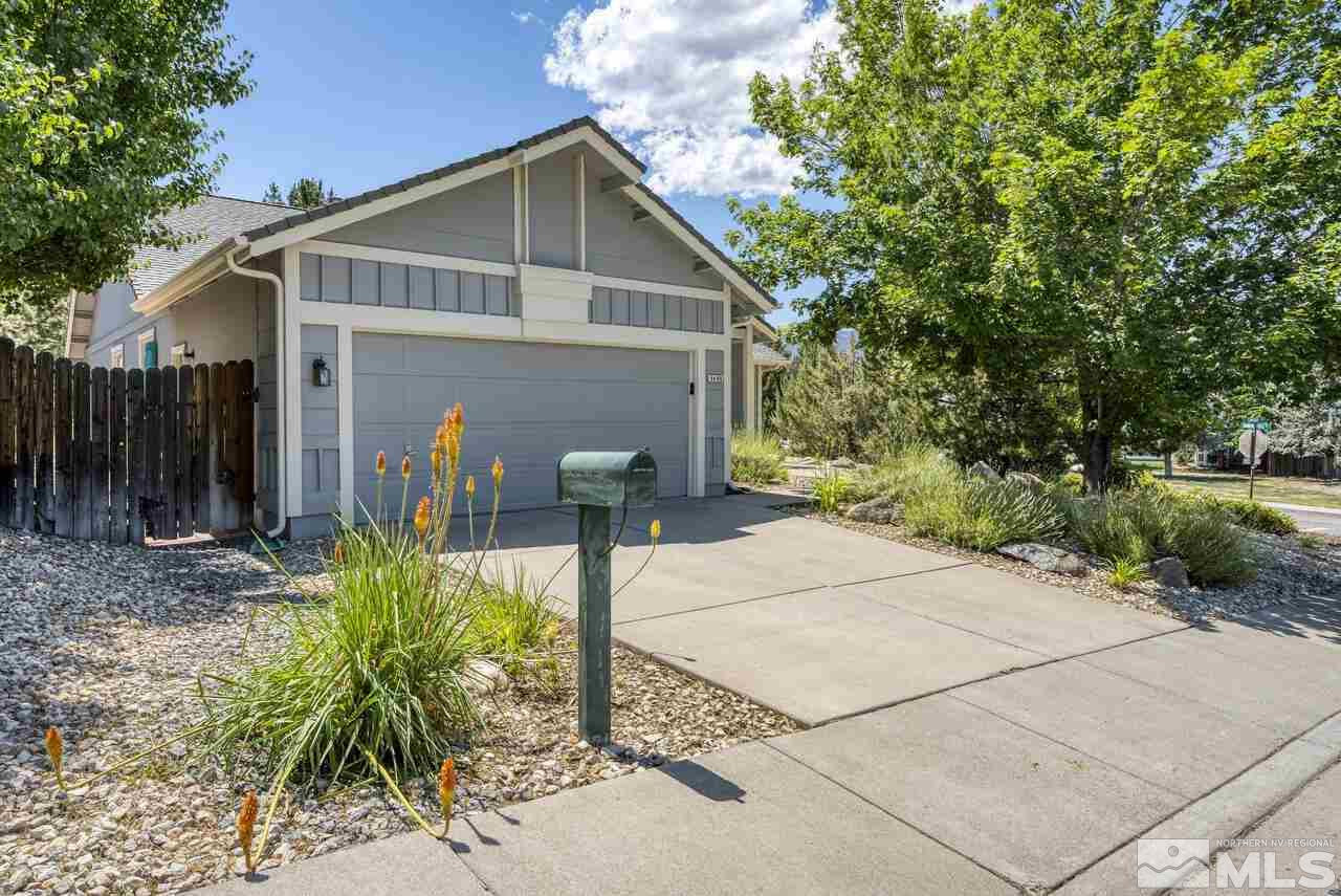5490 Simons Drive Reno, NV 89523 - Photo 1 of 37 a front view of a house with garden