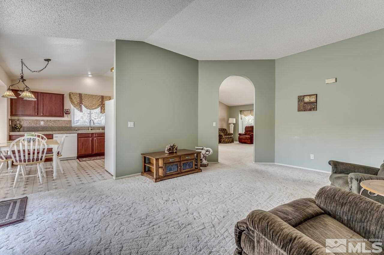 5490 Simons Drive Reno, NV 89523 - Photo 12 of 37 a living room with furniture and a table