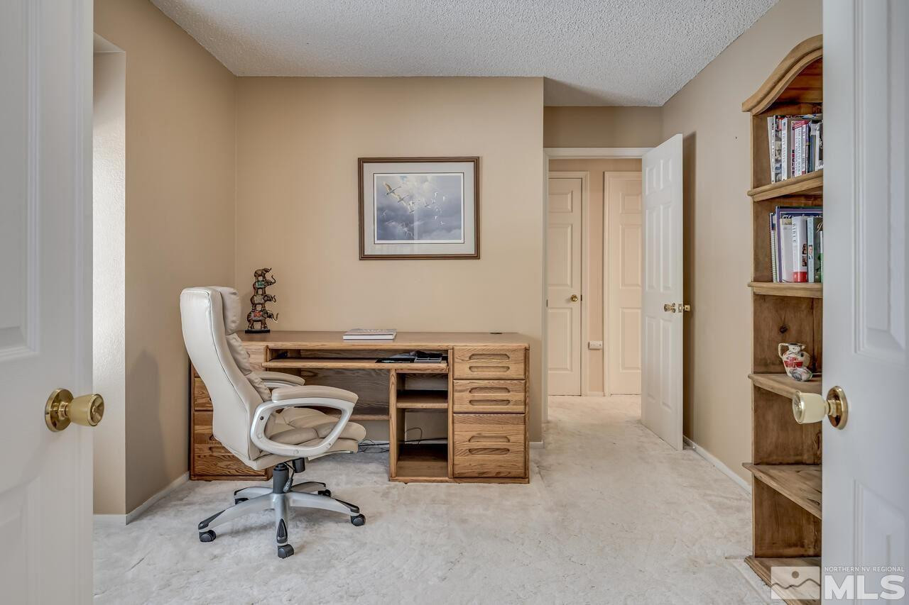 5490 Simons Drive Reno, NV 89523 - Photo 28 of 37 a view of a workspace with furniture