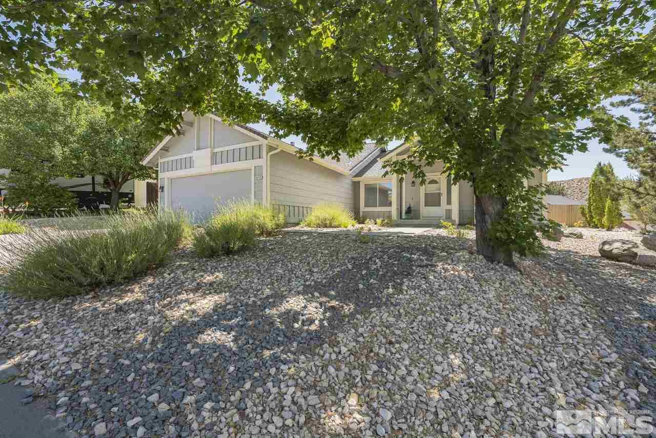 5490 Simons Drive Reno, NV 89523 - Photo 3 of 37 a front view of a house with garden