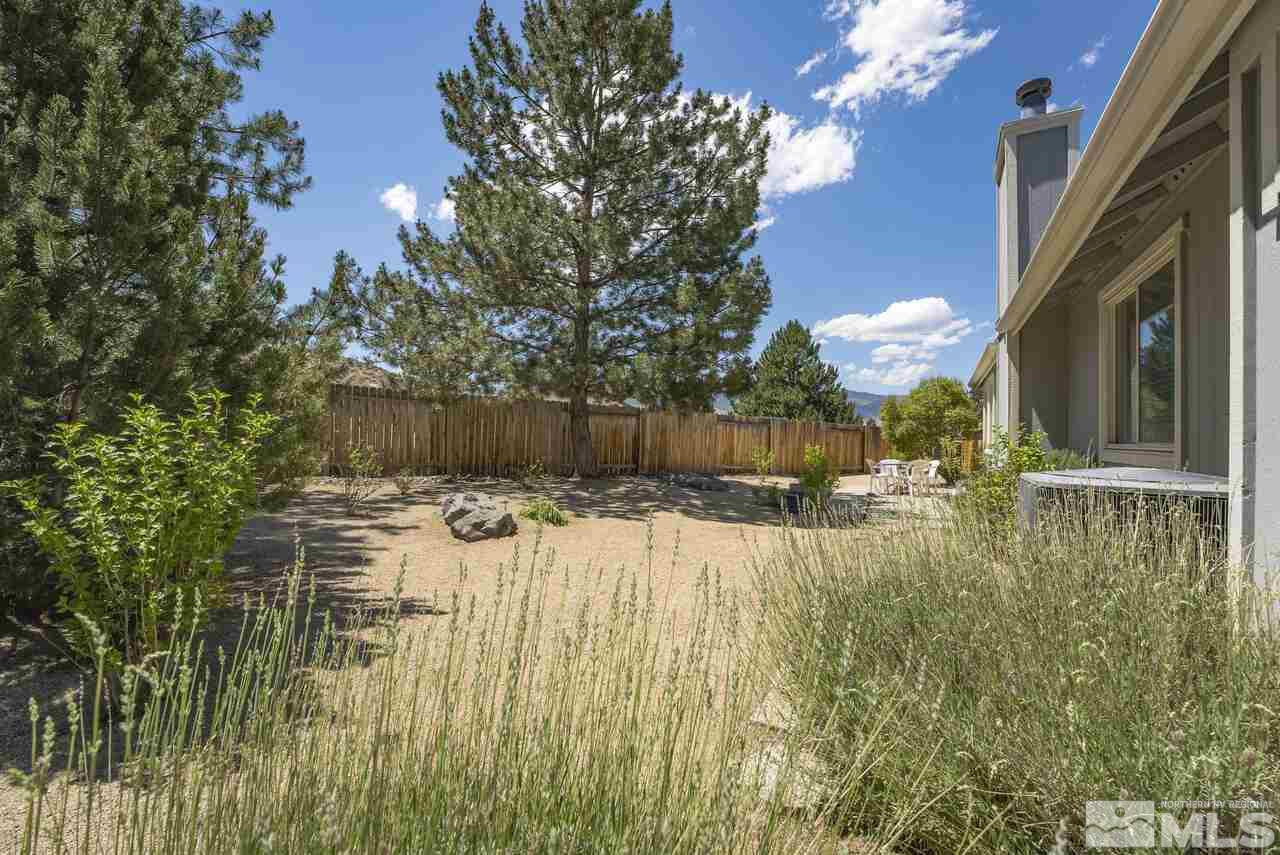 5490 Simons Drive Reno, NV 89523 - Photo 32 of 37 a view of swimming pool with an outdoor space and seating area