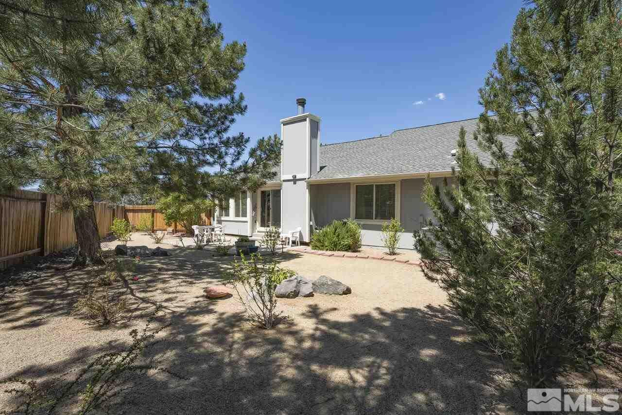 5490 Simons Drive Reno, NV 89523 - Photo 33 of 37 a view of a house with backyard sitting area and garden