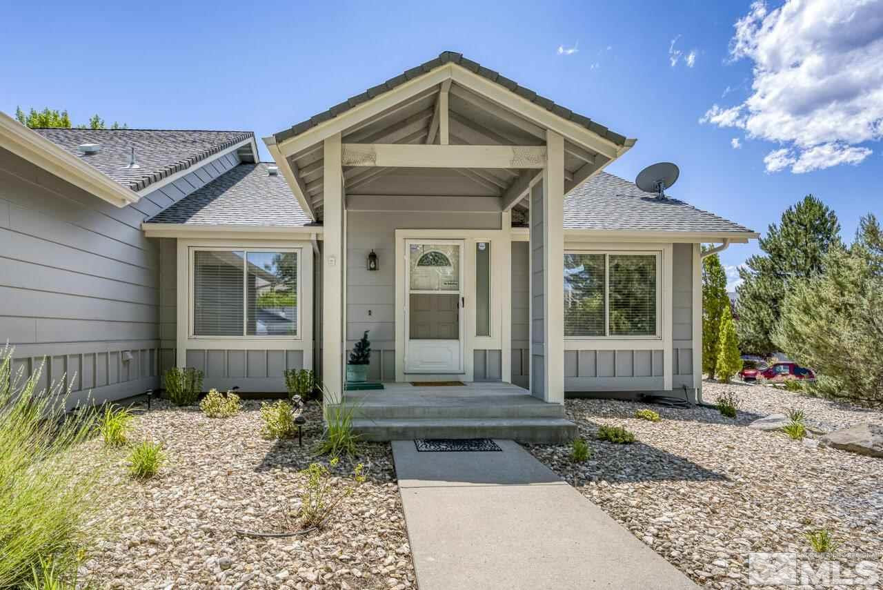 5490 Simons Drive Reno, NV 89523 - Photo 4 of 37 a front view of a house with garden