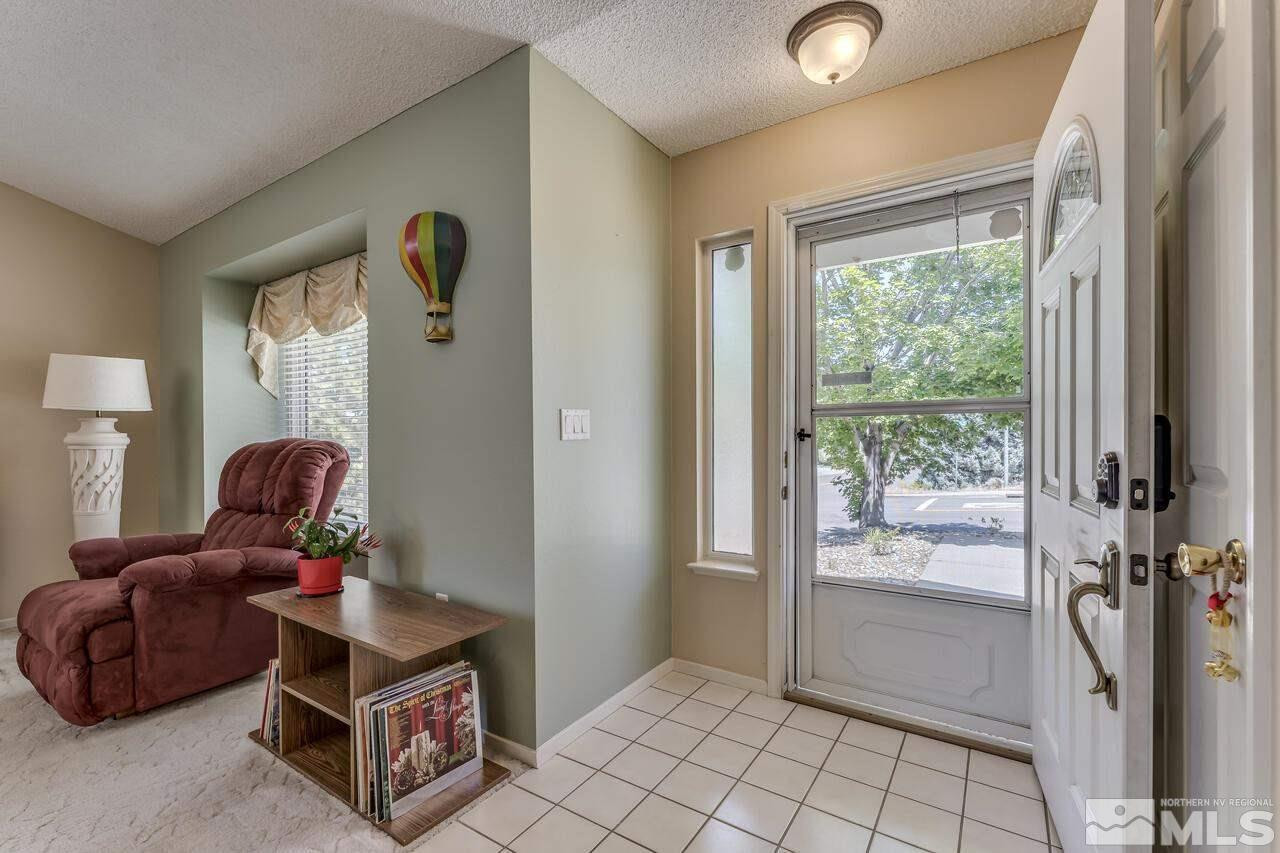 5490 Simons Drive Reno, NV 89523 - Photo 5 of 37 a living room with furniture