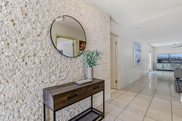 a view of entryway with livingroom