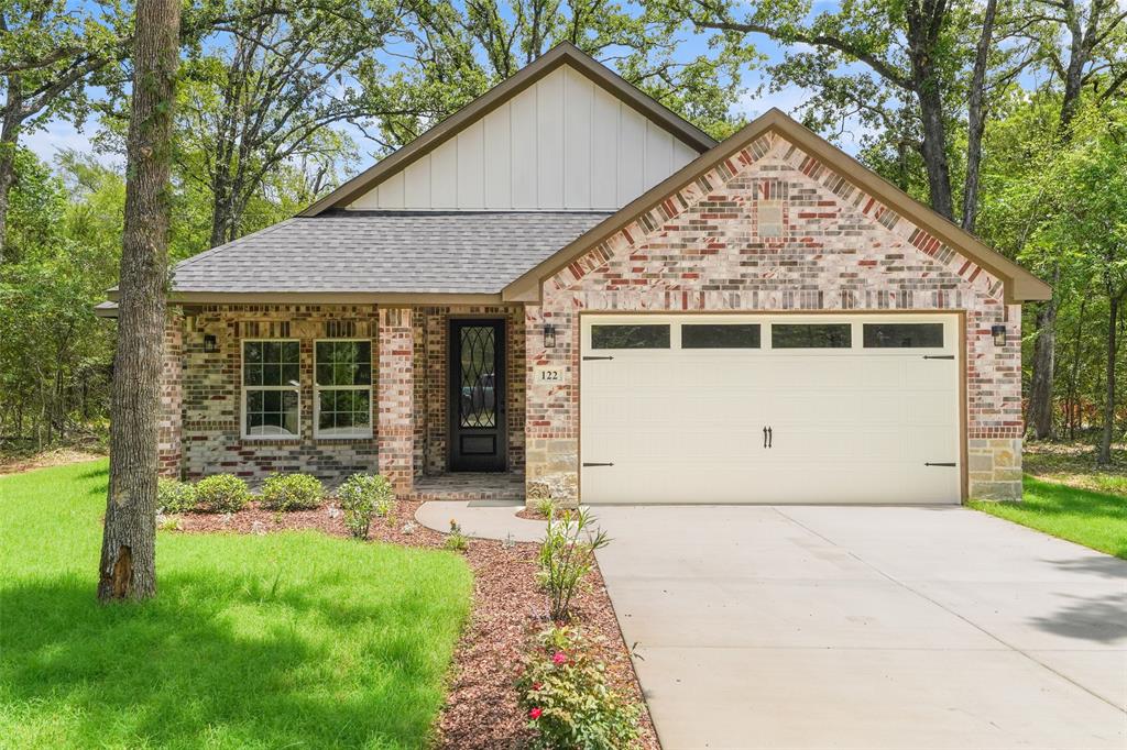 Brick veneer exterior with stone accents
