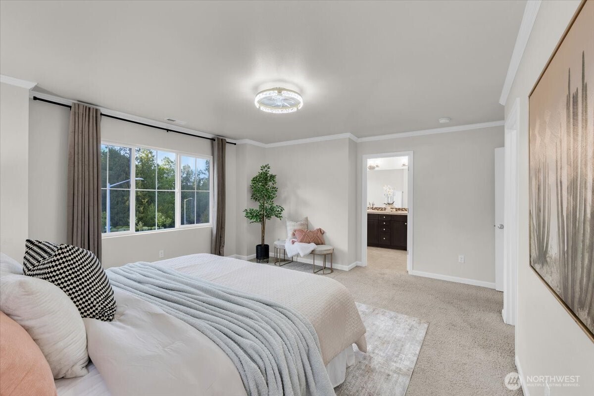 3532 202nd Pl S East Bothell, WA 98012 - Photo 18 of 39 a bedroom with a large bed and a large window