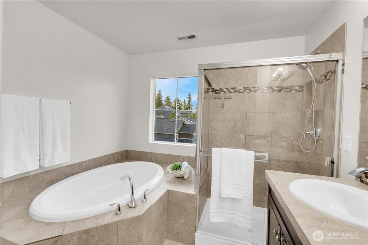 3532 202nd Pl S East Bothell, WA 98012 - Photo 21 of 39 a bathroom with a tub and a sink