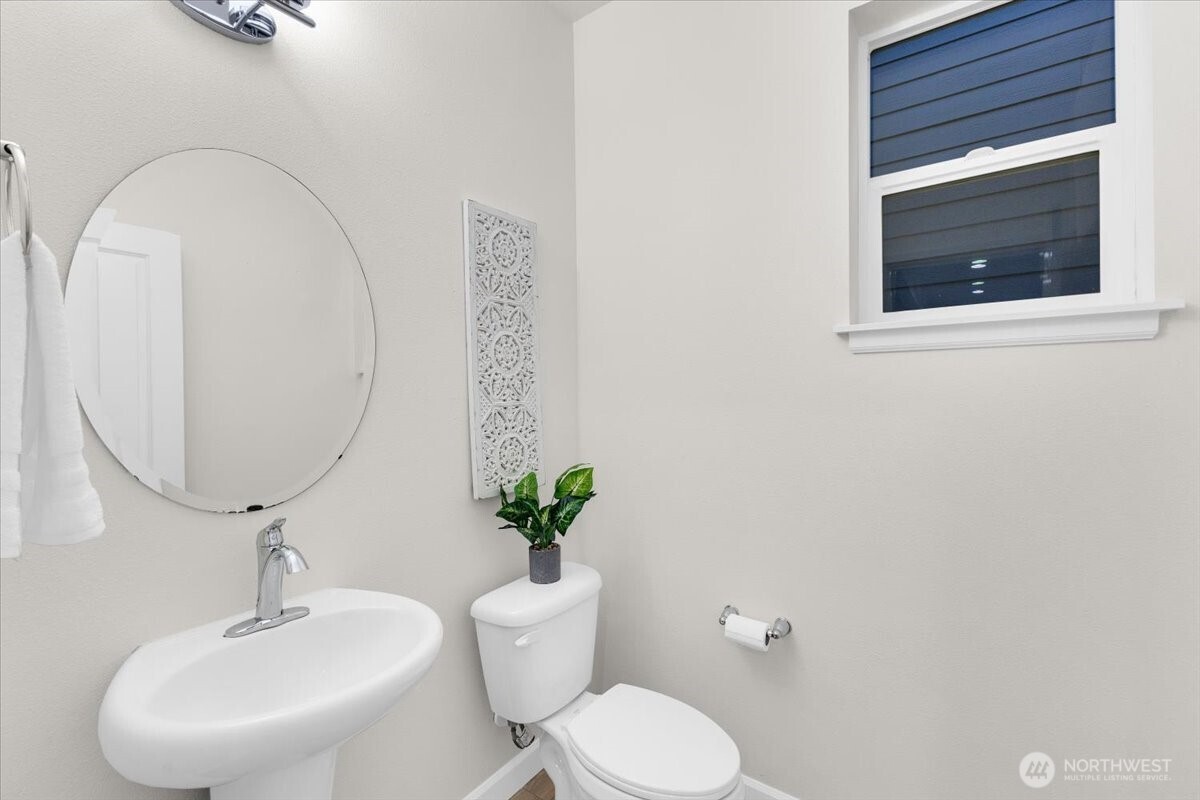 3532 202nd Pl S East Bothell, WA 98012 - Photo 30 of 39 a bathroom with a toilet sink and mirror