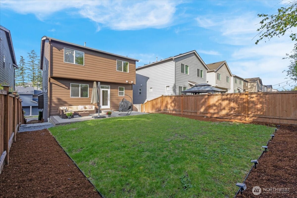 3532 202nd Pl S East Bothell, WA 98012 - Photo 31 of 39 a front view of a house with yard