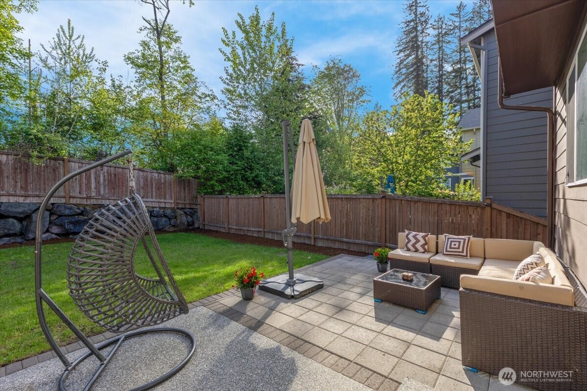3532 202nd Pl S East Bothell, WA 98012 - Photo 32 of 39 a view of a backyard with furniture and a backyard