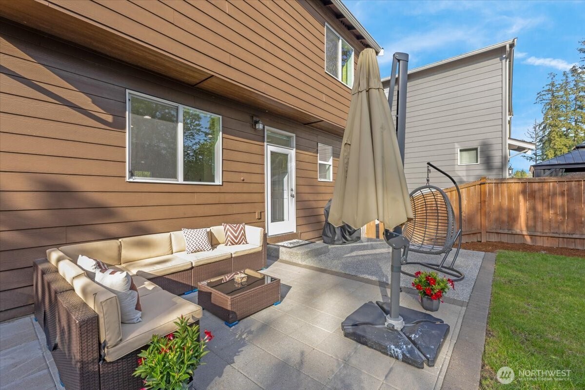 3532 202nd Pl S East Bothell, WA 98012 - Photo 33 of 39 a backyard of a house with seating space