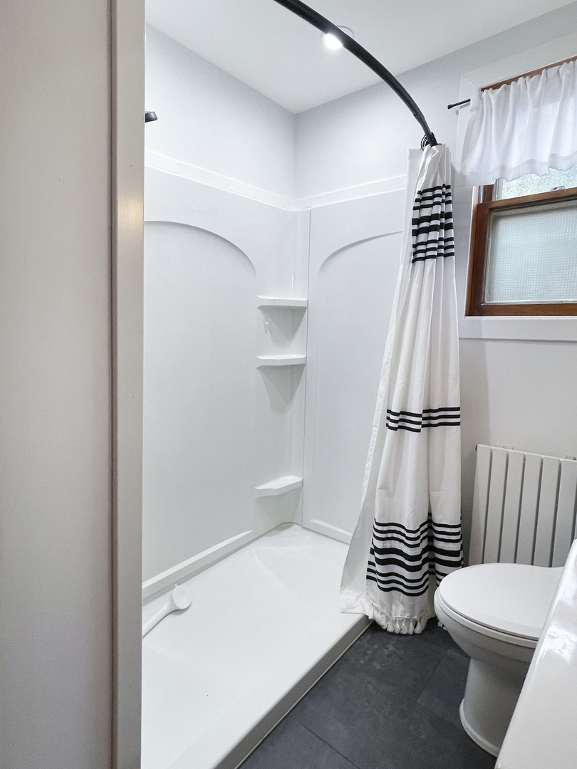 830 Chartres Street LaSalle, IL 61301 - Photo 13 of 30 a bathroom with a sink and a toilet