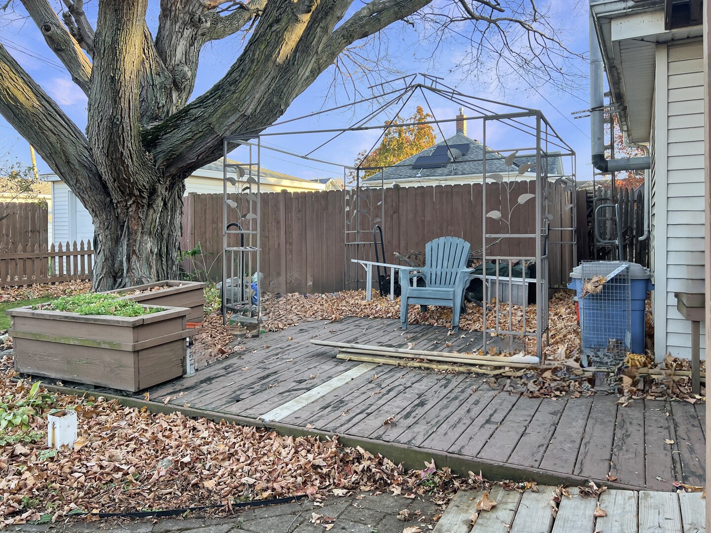 830 Chartres Street LaSalle, IL 61301 - Photo 30 of 30 a view of a patio with couple of chairs and wooden floor