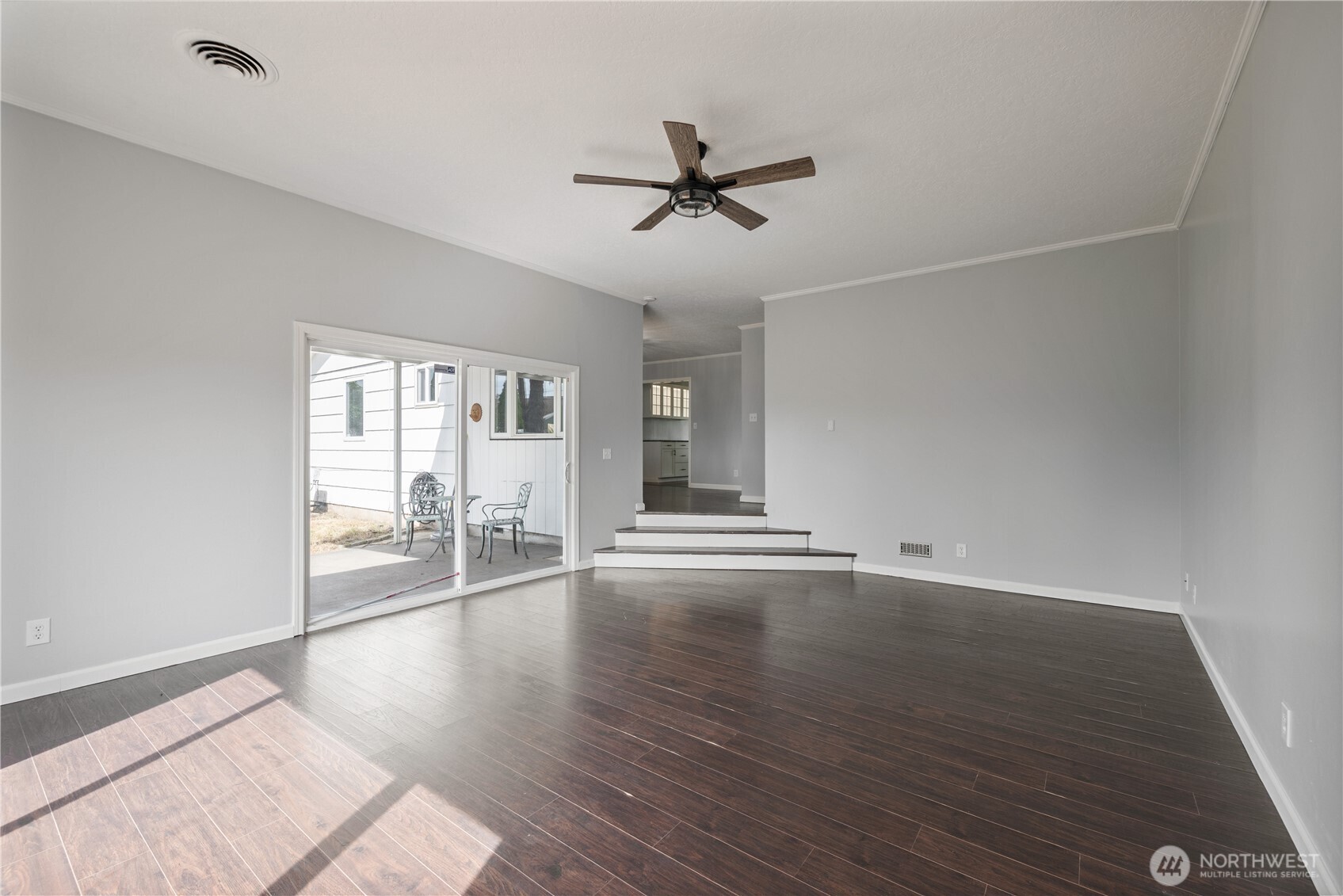 2017 28th Avenue Longview, WA 98632 - Photo 15 of 37 an empty room with wooden floor and windows
