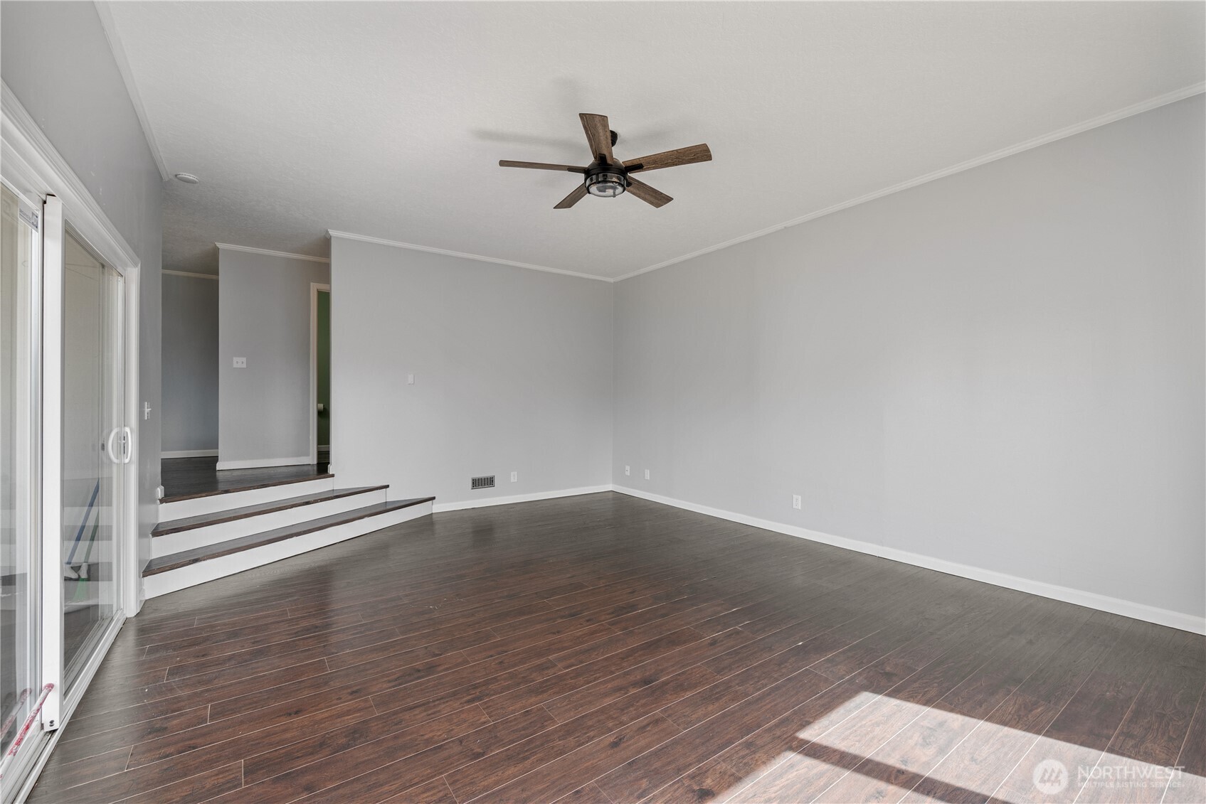 2017 28th Avenue Longview, WA 98632 - Photo 17 of 37 an empty room with wooden floor and windows