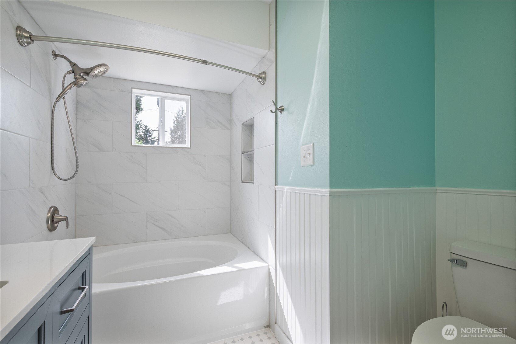 2017 28th Avenue Longview, WA 98632 - Photo 22 of 37 a bathroom with a tub a sink and a shower
