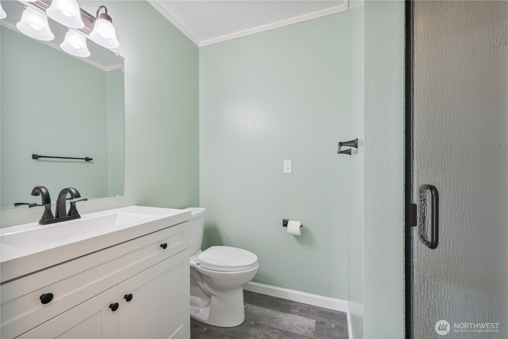 2017 28th Avenue Longview, WA 98632 - Photo 27 of 37 a bathroom with a sink a toilet and a mirror