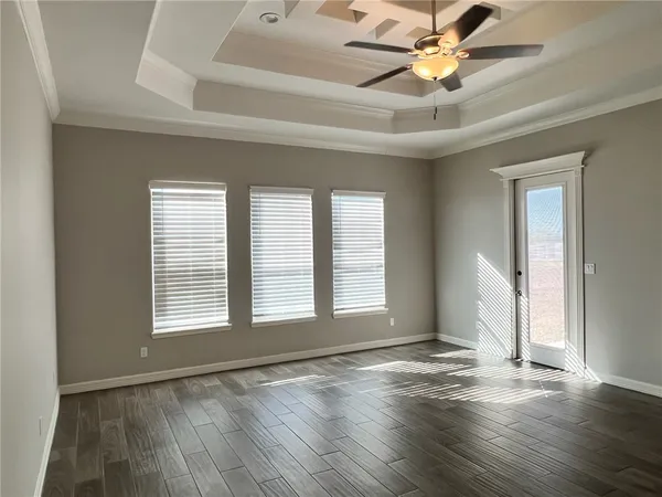 a spacious bathroom with a bathtub and a sink