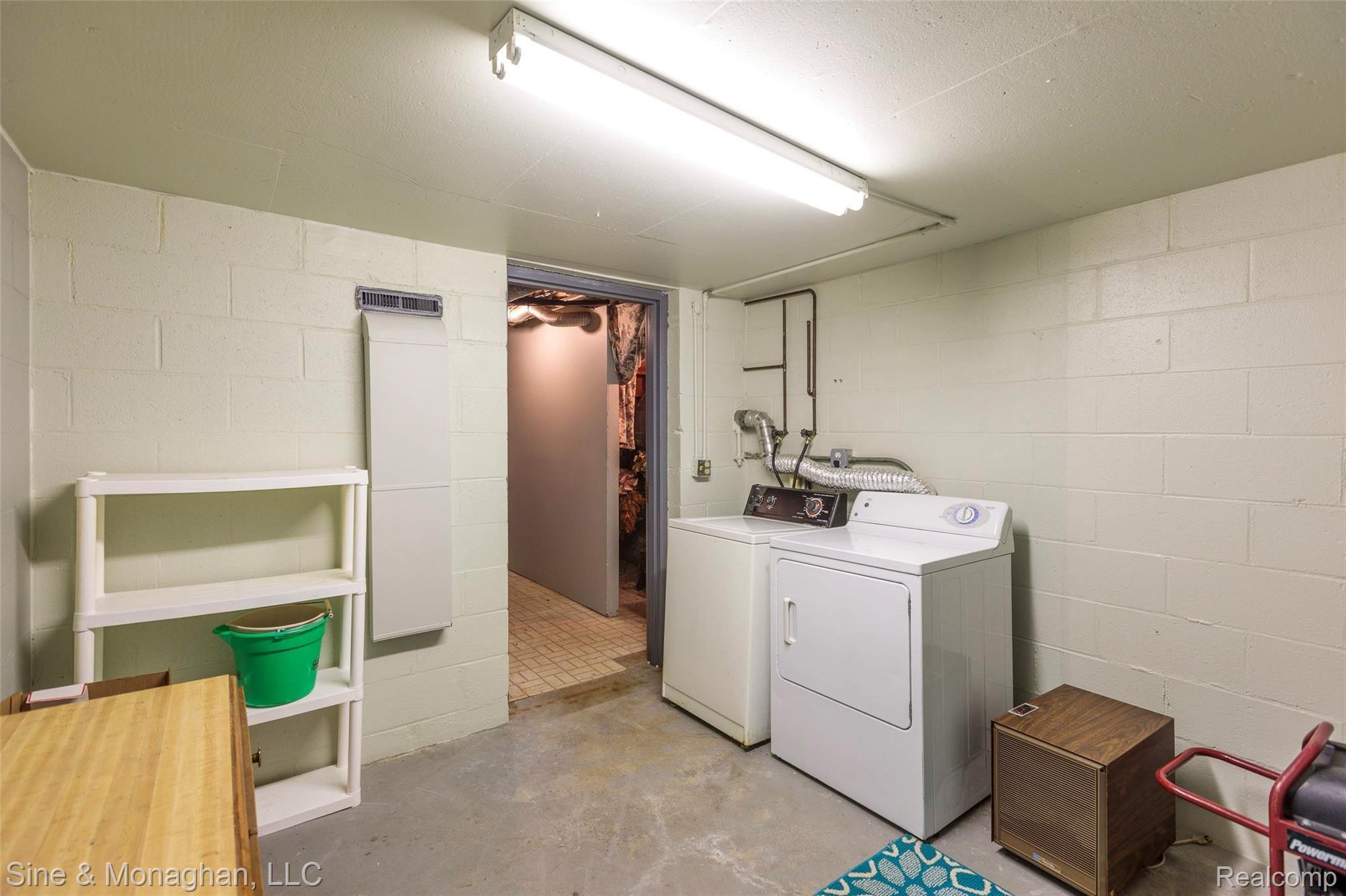 2437 River Road St. Clair, MI 48079 - Photo 51 of 68 52 LAUNDRY ROOM HAS STORAGE SPACE 2437 River Rd.jpg