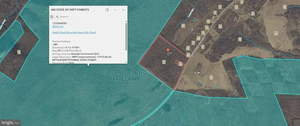 a view of a pathway with a wrought fence