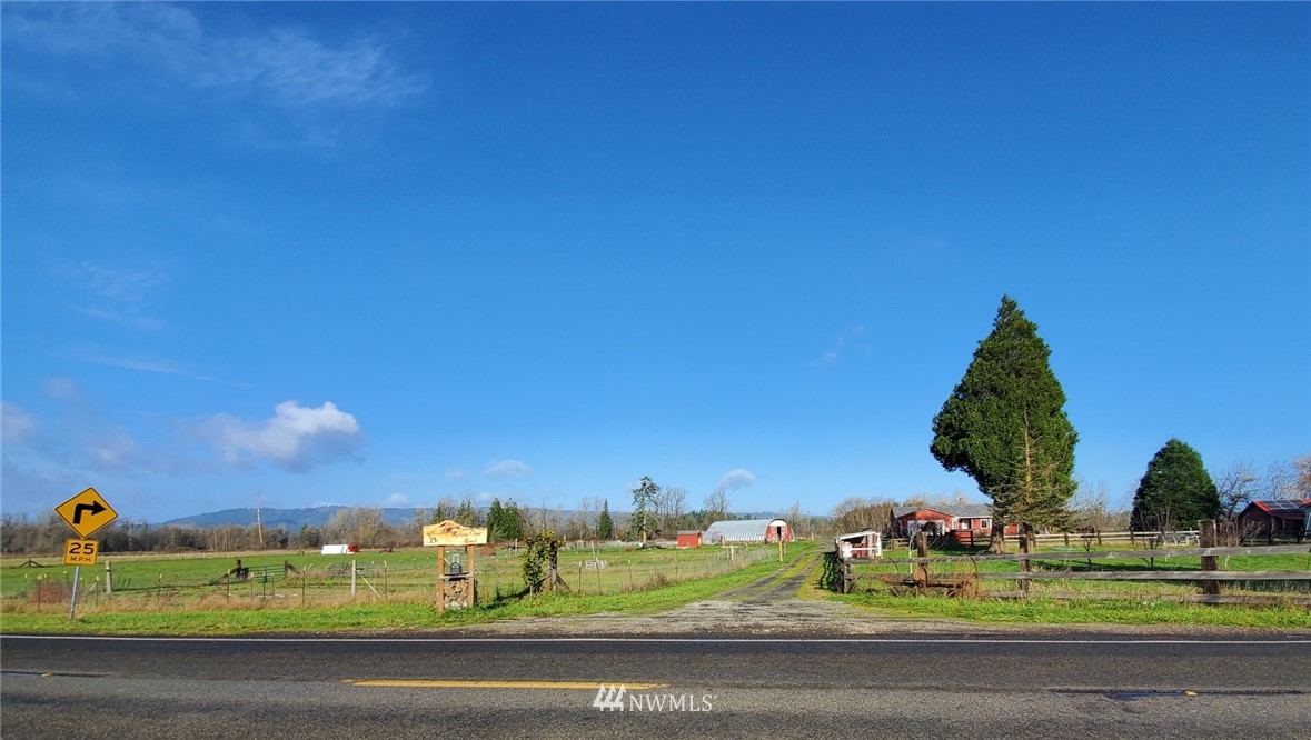 11020 Independence Road Southwest Rochester, WA 98579 - Photo 5 of 38 a view of a tennis ground with a houses