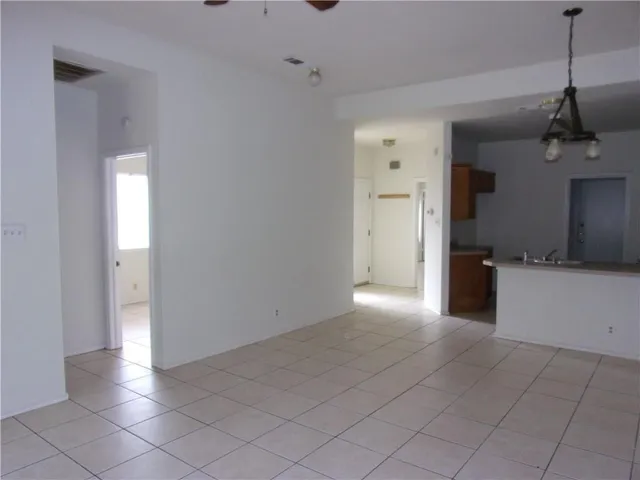 a view of a kitchen with a sink and dishwasher kitchen appliances
