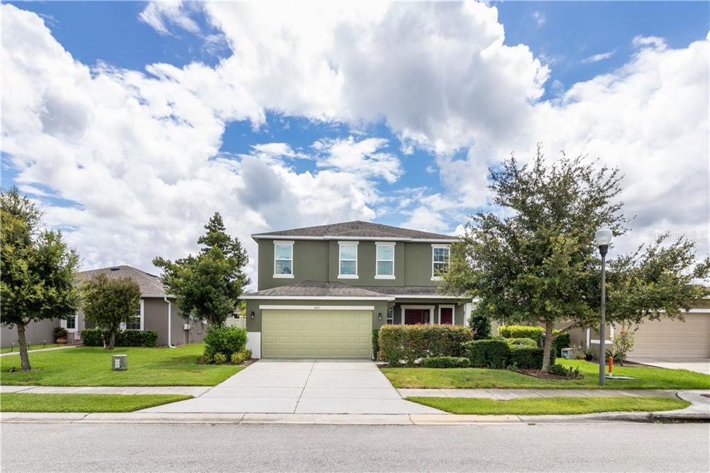 1665 Tamarind Road Davenport, FL 33896 - Photo 1 of 1 Breathtaking curb appeal with a manicured lawn and landscaping
