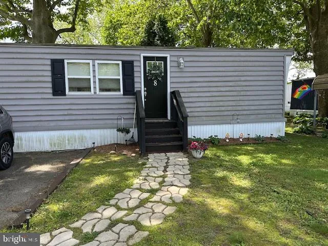 a view of a back yard of the house