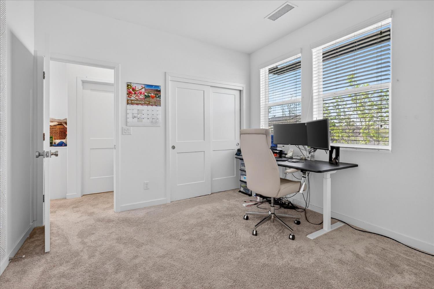 824 Katelyn Avenue Madera, CA 93636 - Photo 22 of 31 a view of a workspace with furniture