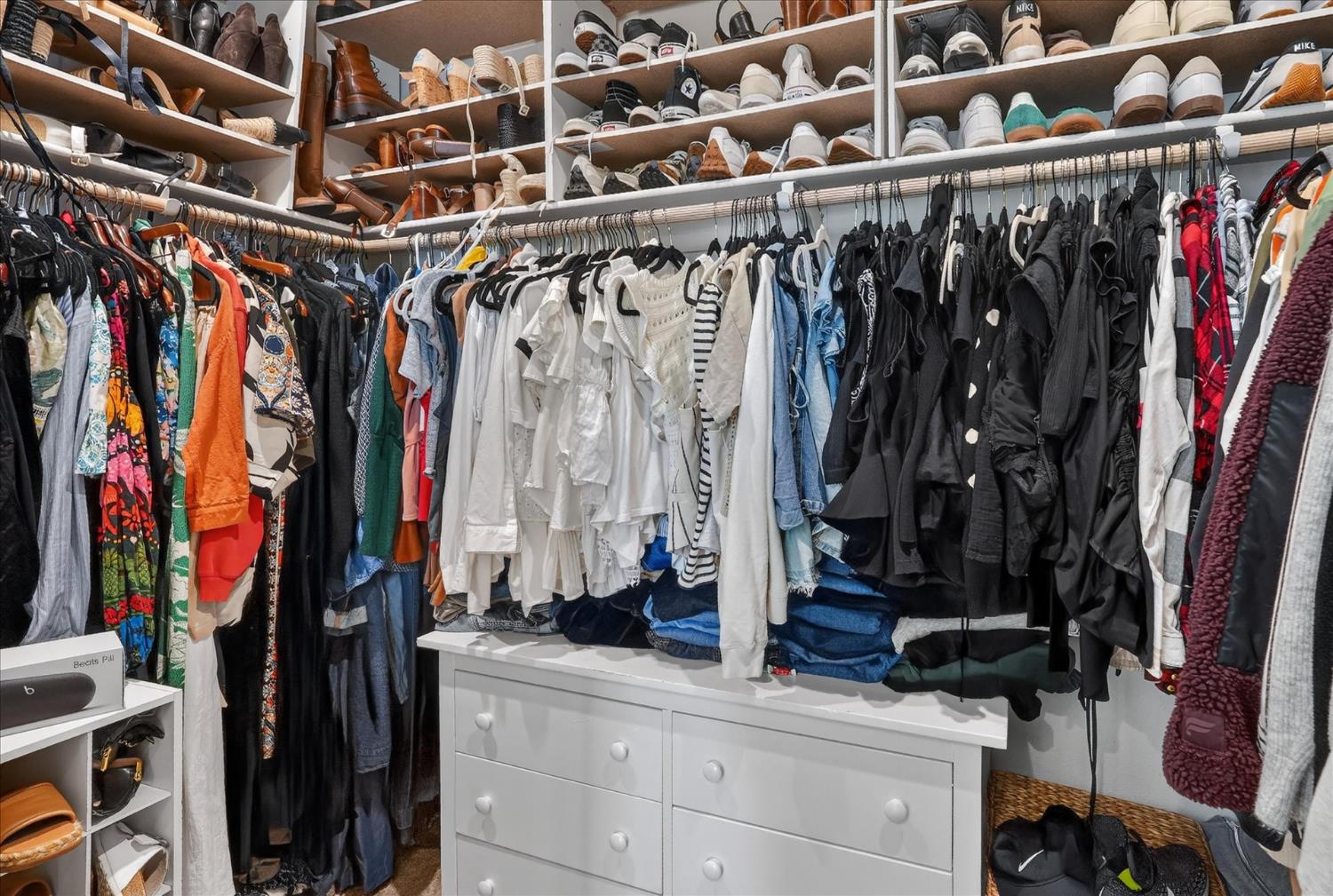 824 Katelyn Avenue Madera, CA 93636 - Photo 28 of 31 a view of walk in closet with clothes and shoes