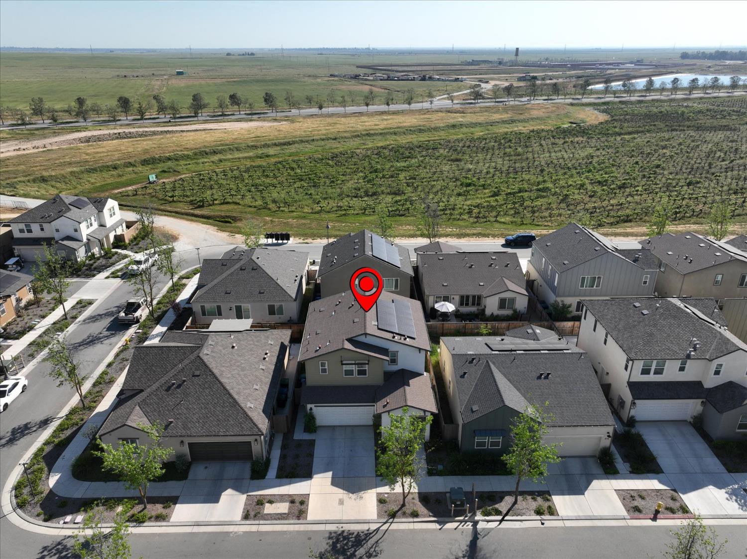 824 Katelyn Avenue Madera, CA 93636 - Photo 30 of 31 an aerial view of a house with a lake view
