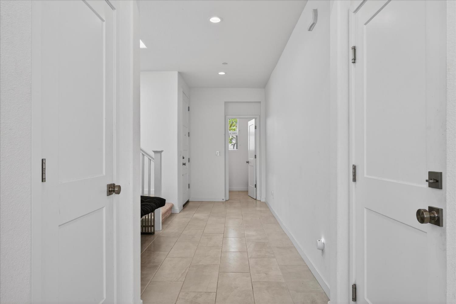 824 Katelyn Avenue Madera, CA 93636 - Photo 7 of 31 a view of a hallway with white walls