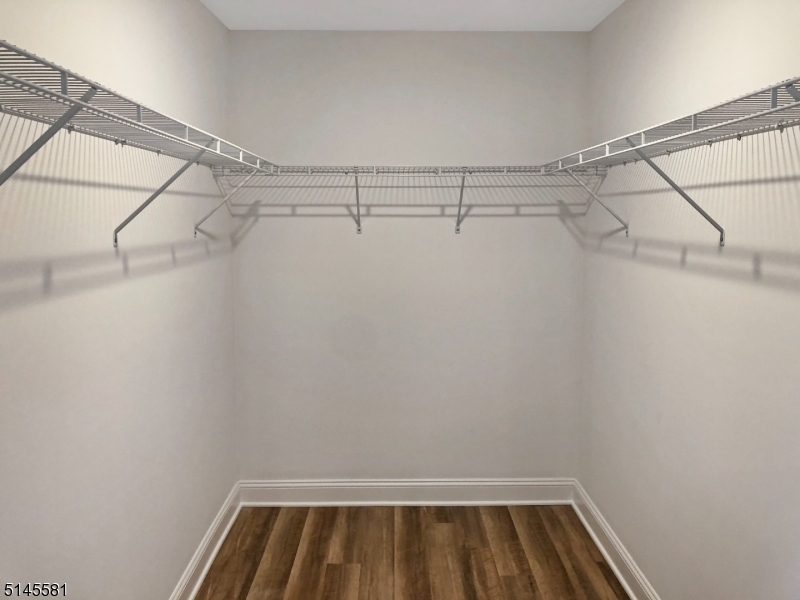 38 Old Shunpike Road, Unit A Randolph, NJ 07869 - Photo 5 of 8 a view of a room with racks on the wall