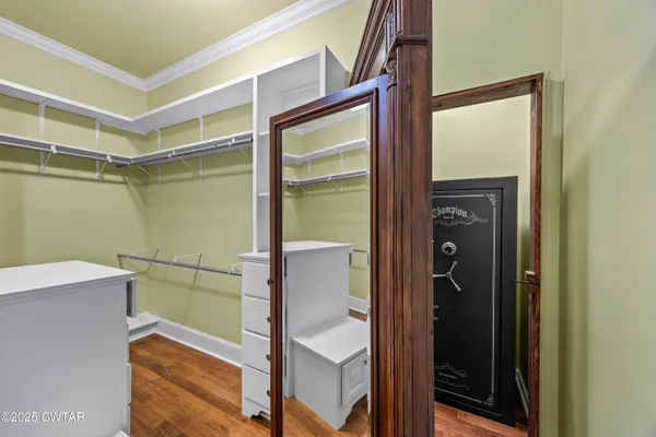 a view of a swimming pool with a yard