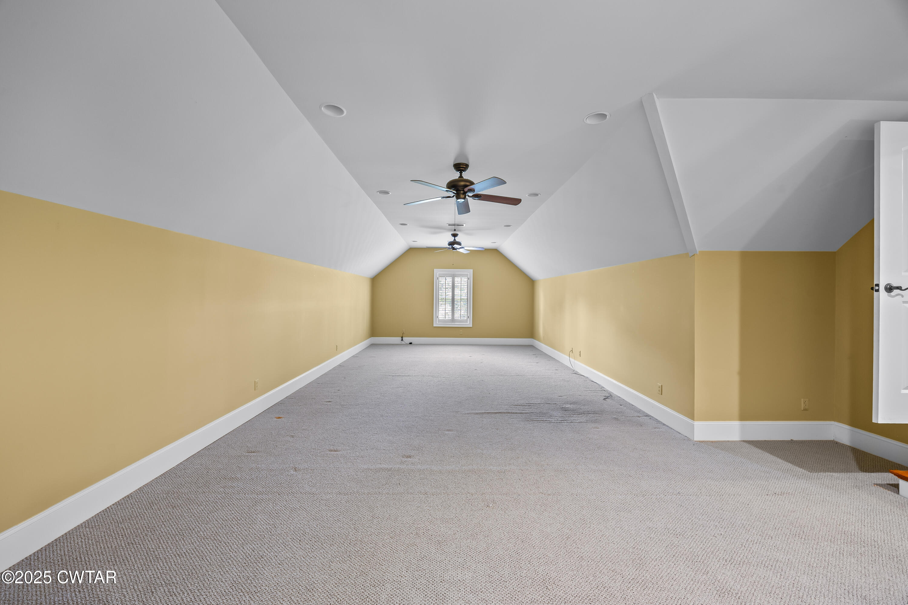 2755 Hornsby Loop Bolivar, TN 38008 - Photo 19 of 28 a view of a hallway with a chandelier