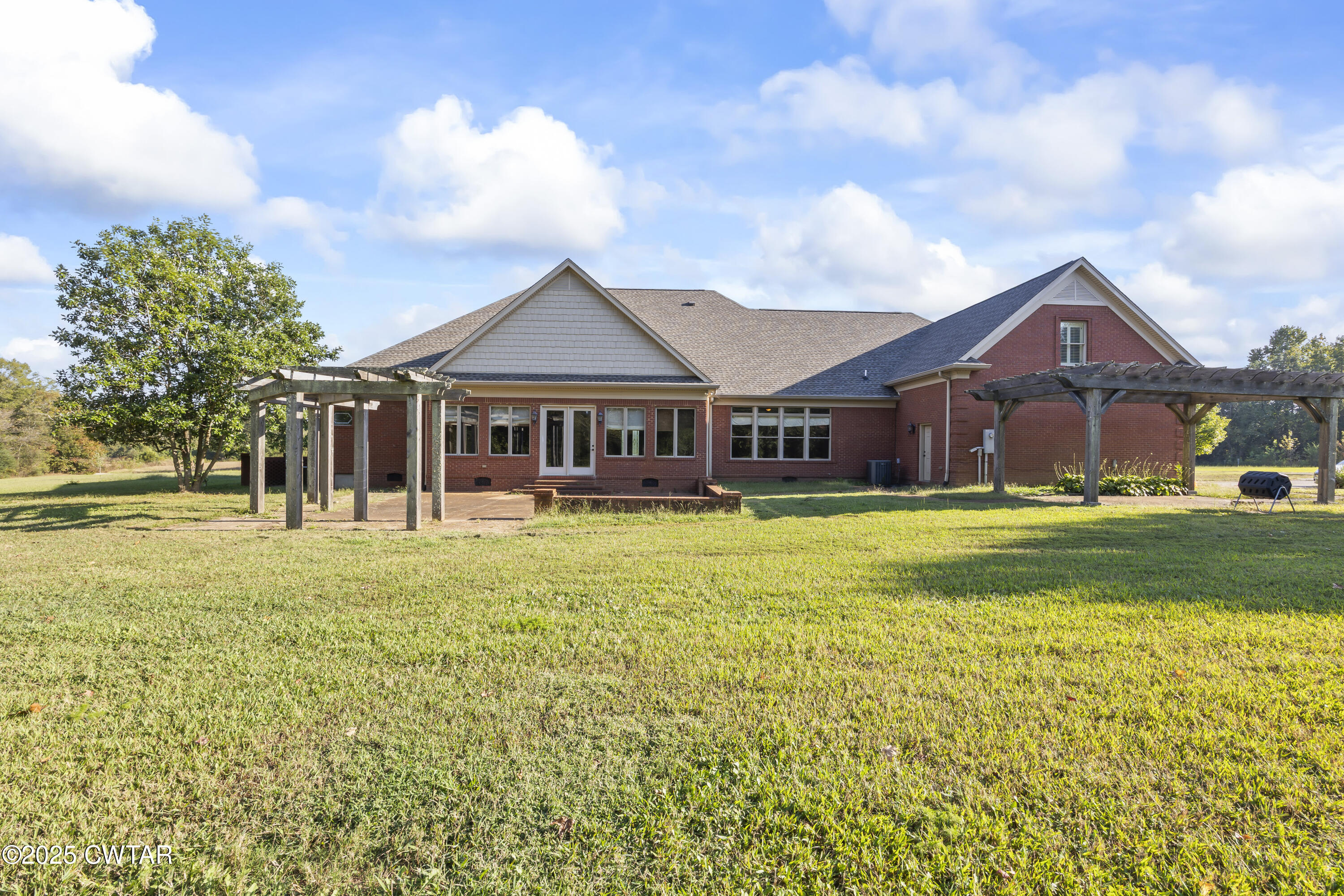 2755 Hornsby Loop Bolivar, TN 38008 - Photo 24 of 28 a front view of a house with a garden