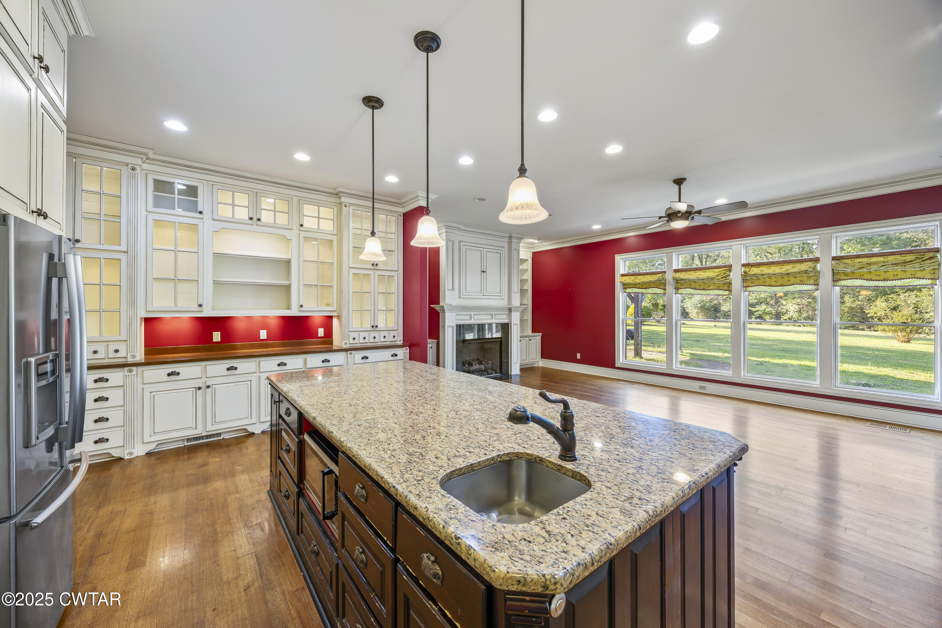 2755 Hornsby Loop Bolivar, TN 38008 - Photo 6 of 28 a kitchen with a stove sink and refrigerator