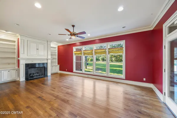 a bathroom with a sink a mirror and a shower