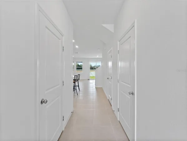 a view of a hallway with a furniture