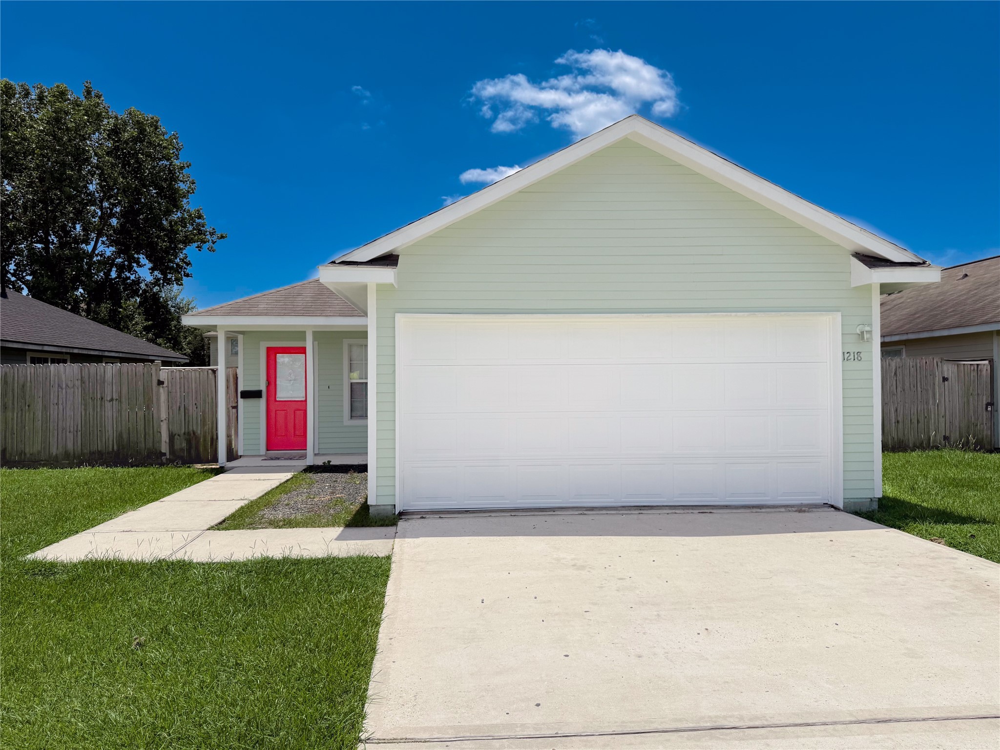 a front view of house with yard