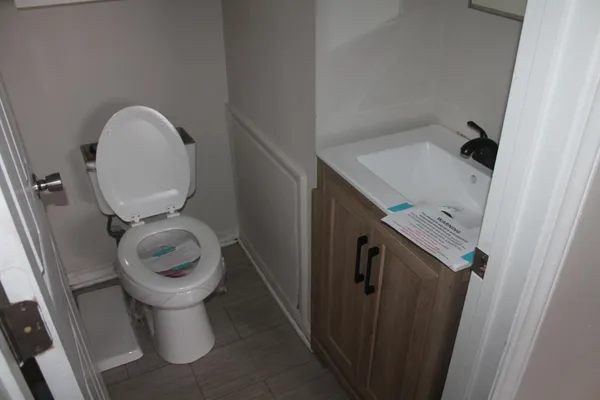 a bathroom with a sink and a toilet