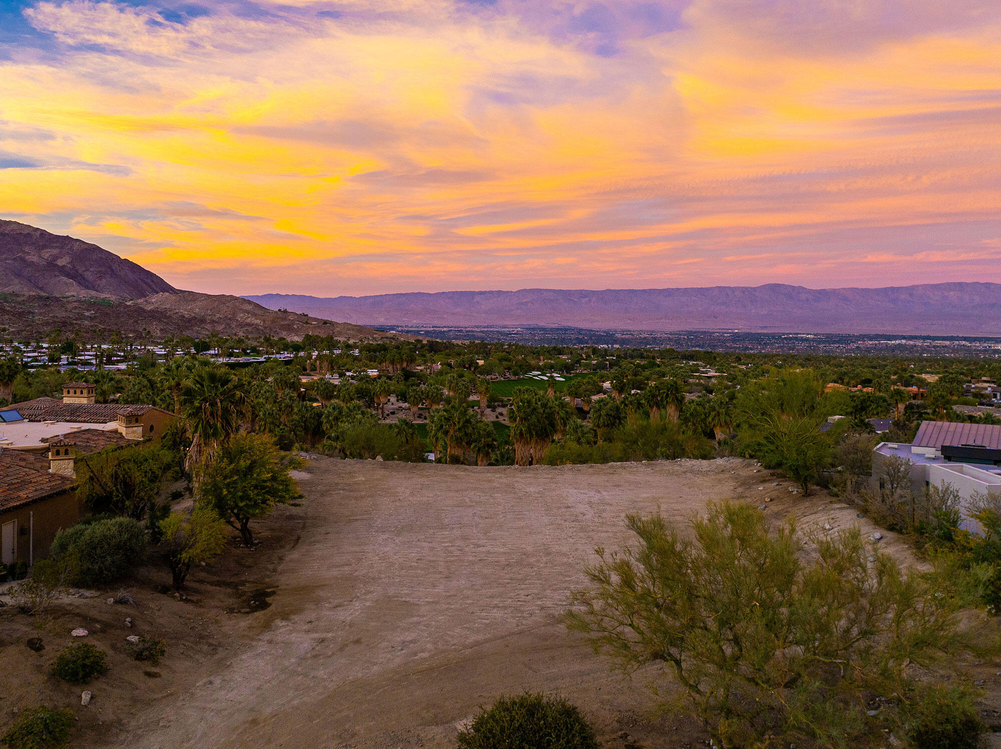 206 Palm Ridge Palm Desert, CA 92260 - Photo 13 of 14 a view of a lake with sunset
