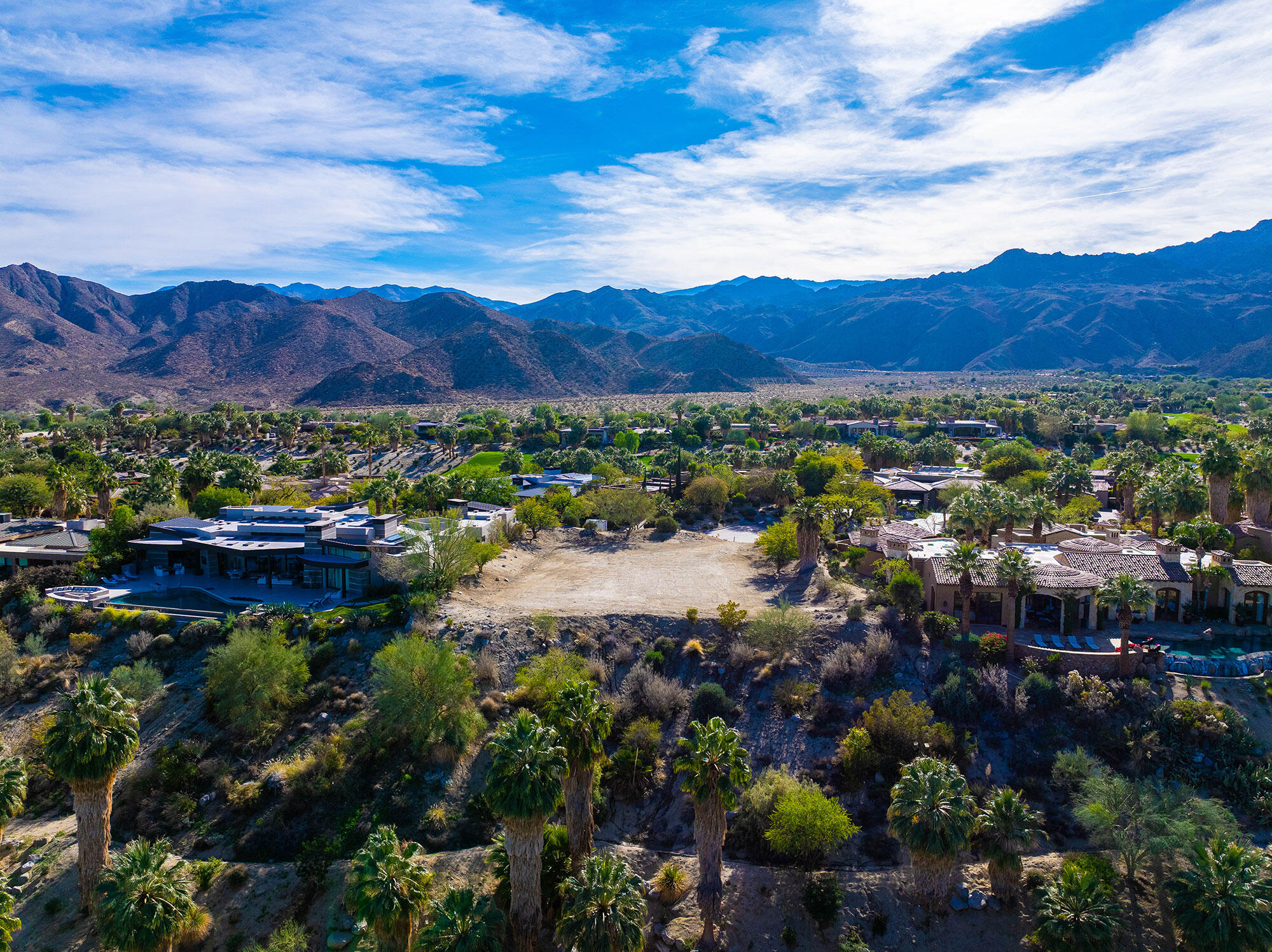 206 Palm Ridge Palm Desert, CA 92260 - Photo 4 of 14 a view of a city with mountains in the background