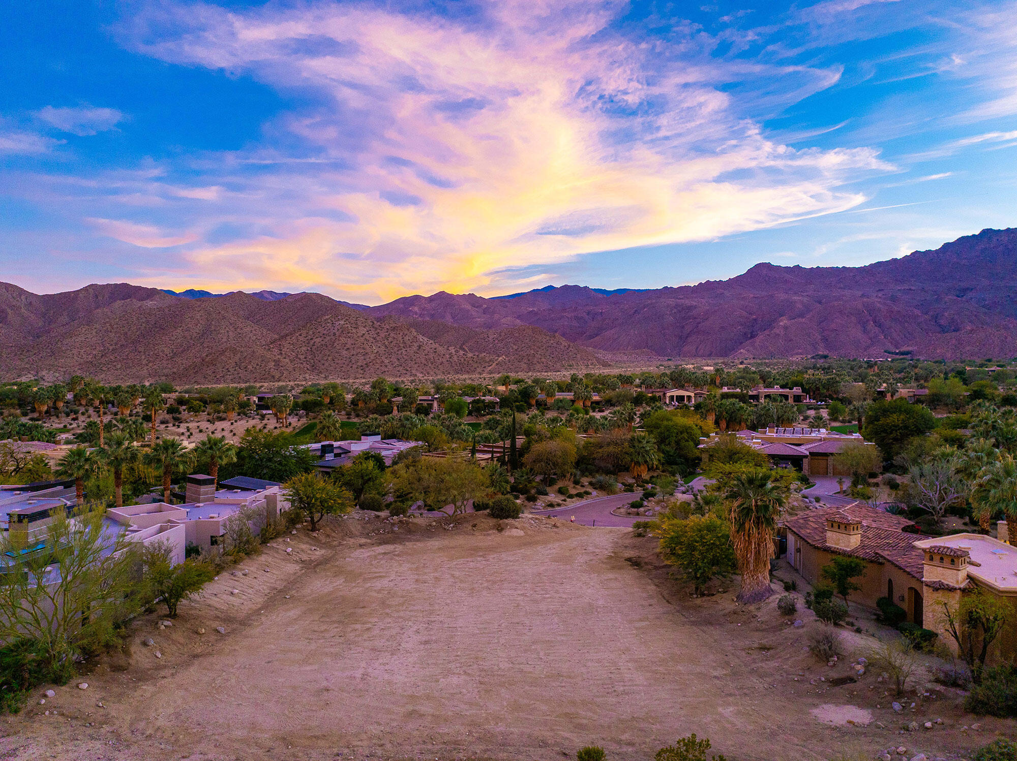 206 Palm Ridge Palm Desert, CA 92260 - Photo 10 of 14 a view of a lush green hillside and houses
