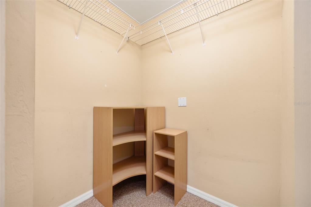7462 Southwest 84th Drive Gainesville, FL 32608 - Photo 20 of 42 a view of an empty walk in closet