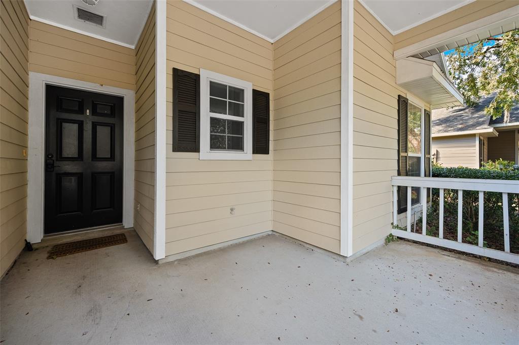 7462 Southwest 84th Drive Gainesville, FL 32608 - Photo 3 of 42 a view of a house with a balcony