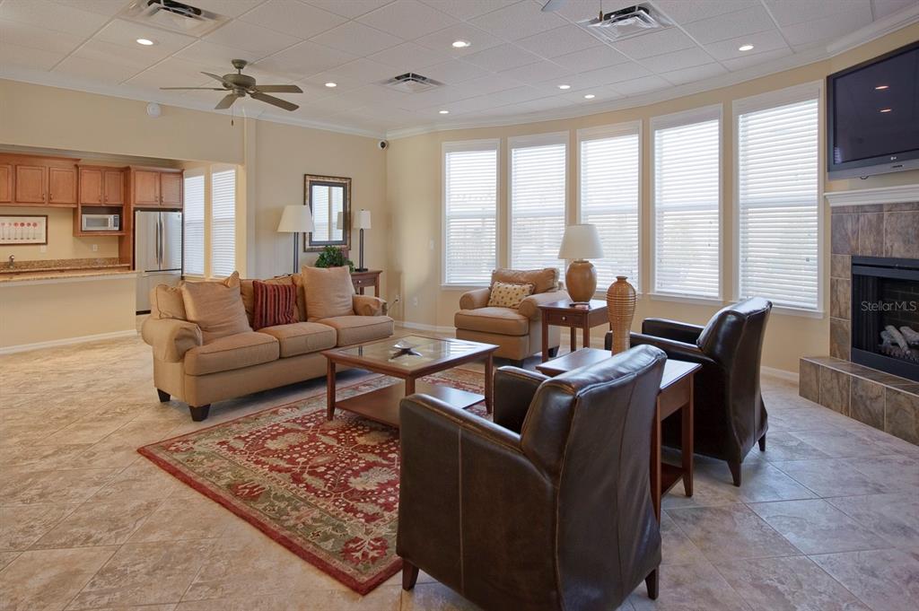 7462 Southwest 84th Drive Gainesville, FL 32608 - Photo 33 of 42 a living room with fireplace furniture and a large window