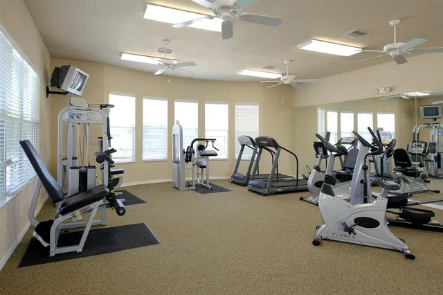 a view of a room with gym equipment
